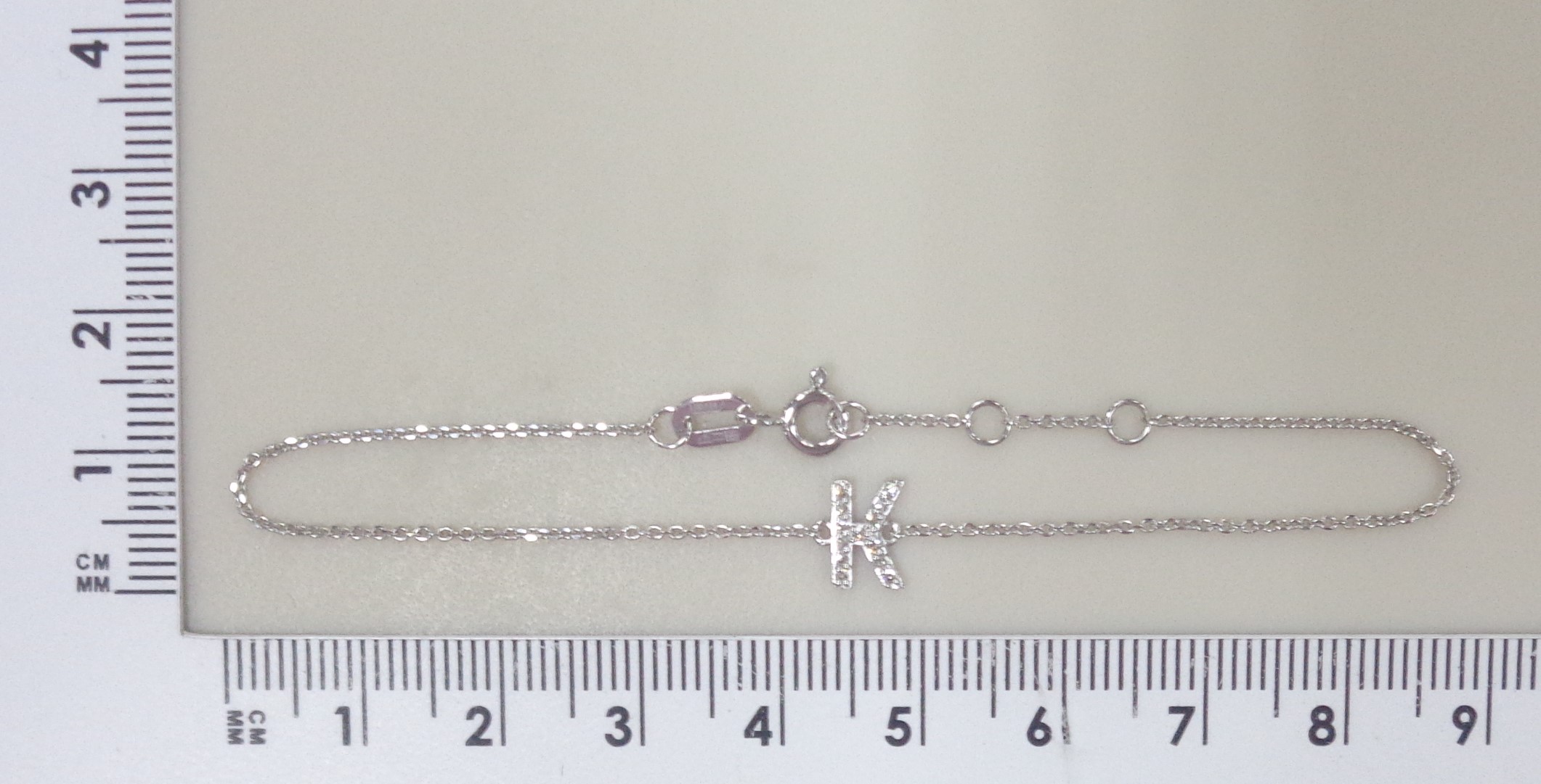 Браслет из белого золота с бриллиантами "К"